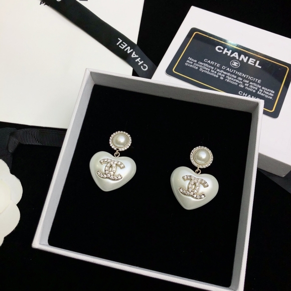 "Regal Rosettes: Rose Gold Statement Earrings by CHANEL" - Picture 6 of 8